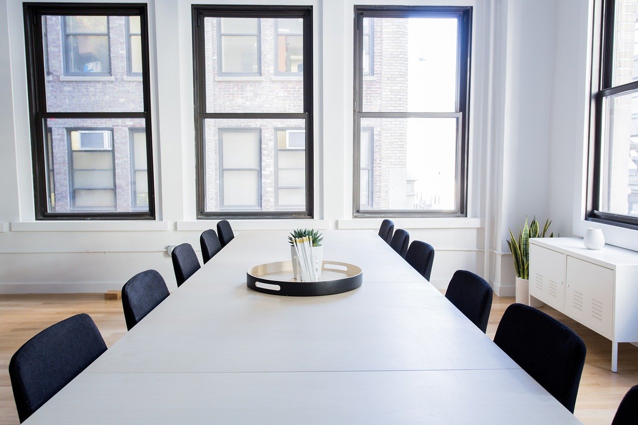 Empty conference table and chairs